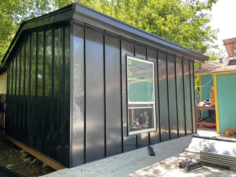 Black standing seam metal wall panels for Metal Roof Installation in York